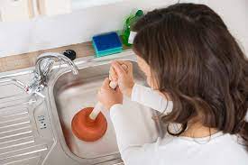 Oh no, what's that horrible smell? Why Your Kitchen Sink Gurgles And How To Fix It