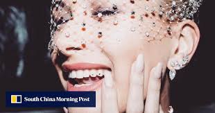 Drake, Katy Perry, Hailey Bieber: tooth gems go viral as celebs and TikTok  stars show off sparkly stones in their smiles