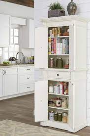 21 Easy Ways To Add Extra Storage To Your Kitchen Purewow Kitchen Organizing Home Sh Extra Kitchen Storage Kitchen Cabinet Storage Simple Kitchen Remodel