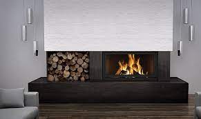 A prefabricated wood burning fireplace. The Napoleon High Country 7000 Wood Fireplace Is Inspired By European Clean Face Design Modern Fireplace Wood Burning Fireplace Inserts Wood Burning Fireplace
