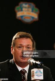 Head coach Bob Stoops of the Oklahoma Sooners speaks during the FedEx...  News Photo