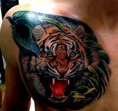Color Tiger Stripes Tattoo For Men On Chest Tattoosformen Tiger Tattoo Design Tiger Stripe Tattoo Tiger Head Tattoo