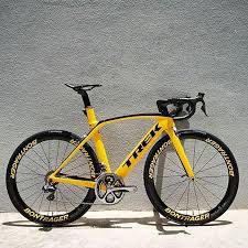 repost pro tour cycling super sporty looking trek madone it kind of reminds you of a yellow ferrari very similar trek madone bicycle road bike cycling