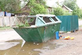 The number of people who live in your home is a big factor in how much trash you create. Big Green Trash Can In Ghetto In The Street Stock Photo Picture And Royalty Free Image Image 31513651