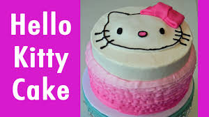 Use candy for the cat's eyes and nose. Hello Kitty Birthday Cake