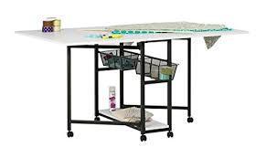 Folds out to 32 x 55, and folds down to roll through doorways and tuck away as an end table. Sew Ready Fabric Cutting Table Multipurpose Hobby And Craft Mobile Table With Storage Charcoal White 13377 Buy Online In Aruba At Aruba Desertcart Com Productid 76132553