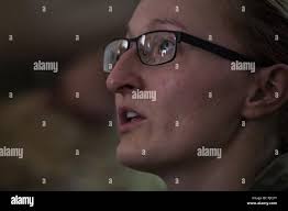 U.S. Army Sgt. Alana Fleming, a combat medic assigned to the 404th Civil  Affairs Battalion, Airborne, provides explanation of care under fire  procedures during the combat lifesaver skills course at the Base