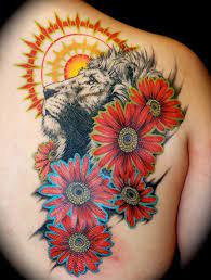 Blackwork tattoo with lion and flower. 150 Amazing Lion Tattoos Meanings Ultimate Guide June 2021
