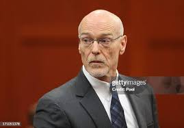 Jury consultant Robert Hirschhorn and George Zimmerman stand during... News  Photo