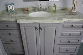 Dolace obscured tempered glass with pebble pattern. Bathroom Kraftmaid Marquette Door Style Maple Pebble Grey American Traditional Bathroom Dc Metro By Dean Home Supply Service Co Houzz