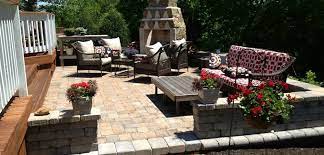 The small backyard provided great green space. Raised Patios Are A Beautiful Option For Sloped Backyards Eagleson Landscape Co