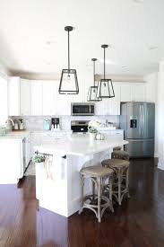 Pendants provide a beautiful thing that your kitchen island needs. Our Big Light Swap Abby Lawson
