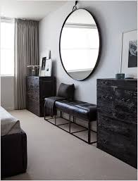 San Francisco Beige Carpet Black Bed Black Bench Black Dresser Framed Artwork Gray Bedding Gray Cur Large Round Mirror Mirrored Bedroom Furniture Round Carpets