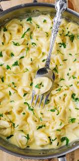 Maybe you would like to learn more about one of these? Delicious Tortellini Smothered In A Creamy Asiago Cheese Garlic Sauce Easy 30 Minute Pasta Recipe Loved It Recipes Food Pasta Dishes
