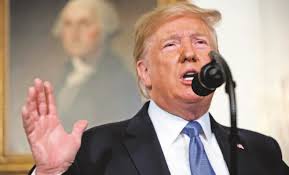 Trump vows action after shootings, but gives few details