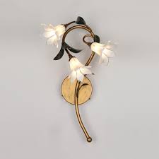 Simple industrial home warehouse flavor wall mounted with natural steel patina. Flower Wall Sconces Paulbabbitt Com