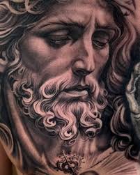 Tattoo artist completes meaningful black and gray piece