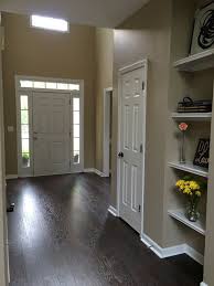 The pergo laminate is a very high quality laminate, gives a similar look to the real hardwood and can give your house a new look. Foyer Pergo Xp Coffee Handscraped Hickory Floor Ralph Lauren Na10 Sisal Walls Pergo Flooring Floor Remodel Flooring Options