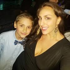 Who can recommend a photographer for candid family photos in Corolla Beach,  NC?