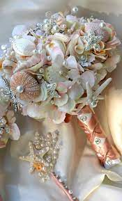 One of a group of shell bouquets i made for a wedding. Pink Sea Shell Wedding Bouquet Blush Bridal Bouquet Bridal Brooch Bouquet 275 00 Via Etsy Thi Bridal Brooch Bouquet Beach Theme Wedding Seashell Wedding