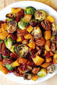 Roasted Brussels Sprouts Cinnamon Butternut Squash Pecans And Cranberries Recipe Veggie Dishes Vegan Thanksgiving Recipes Vegetable Dishes