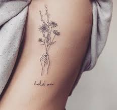Outside Right Wrist Sisters Are Different Flowers From The Same Garden With My Sister Flowers More In Hand Tattoos Bouquet Tattoo Dainty Tattoos