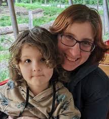 Welcome to MHS! Hi I'm Emmy Carroll! Many of you may know my husband Ryan,  who teaches PLTW and Chemistry at the high school. We live here in town  with our three-year-old