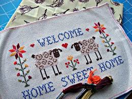 Vintage clothing cross stitch details. Cross Stitch Needle And Ladle