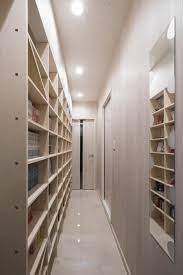 ワンルームマンションの廊下を利用したコミック収納 壁一面のコミック本棚 奥行180mm shelf no 19 本棚 コミック 本棚 本棚 収納