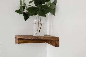 Maybe you would like to learn more about one of these? Greenery In Vase On Wooden Corner Shelf By Nicole Mason