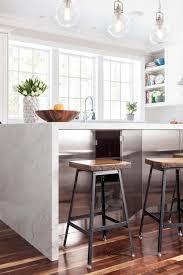 Whether you are enjoying familiar sunday brunches, holiday gatherings while cooking, or simple weeknight dinners, a rectangular or oval chandelier over the kitchen island or long dining table spreads light perfectly for prepping food or romantic dining. West Elm Globe Pendants Design Ideas