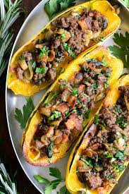 Delicata Squash Is Roasted To Perfection And Stuffed With Ground Beef Caramelized Onions Bacon Sp Squash Recipes Paleo Delicata Squash Yellow Squash Recipes