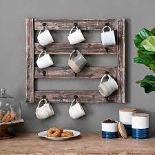 Wall mounted wooden pot rack with a length of 36 in. Rustic Wood Mug Rack With Hooks Kirklands