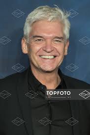 Philip Schofield and wife Stephanie Lowe with Daughters Ruby Lowe (L) and  Molly Lowe (R) attend