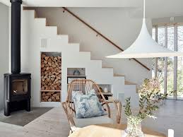 Wooden or stone flooring) and cute, but uncluttered accessorising. Tour A Stylish And Bright Scandinavian Island Getaway Nordic Design