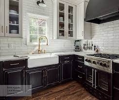 Glaze kitchen cupboards that are painted with a stain several shades darker than the paint color or with a deep brown for a true antique look. Transitional Black Maple Kitchen Cabinets In Custom Finish