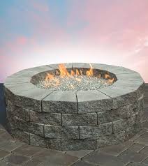 With a round shape and neutral hue, the design is versatile enough to blend with your traditional setting. Fire Tables Fire Pits Cambridge Pavingstones Outdoor Living Solutions With Armortec