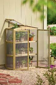 How To Build A Mini Greenhouse Home Greenhouse Mini Greenhouse Greenhouse Plans