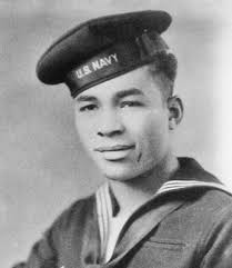 Longtime teacher here quit college, joined the Navy