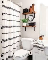 Design firm etc.etera opted for striped roman shades, but flowing curtains will also do the trick. 150 Bathroom Ideas For Your Apartment Bathroom Decor Apartment Bathroom Bathrooms Remodel