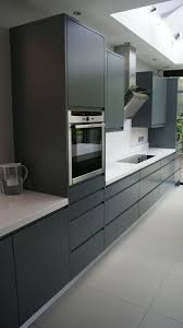Black And White Kitchen Matt Modern Handle Less Grey Matt Painted Bespoke Kitchen With White Silestone Tops In Kingsto Kitchen Remodel Small Trendy Kitchen Backsplash Modern Kitchen Design