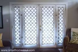 The doors have windows over much of the surface, which some homeowners choose to leave uncovered. Simple French Door Curtains Easy Diy Tutorial Girl Just Diy