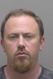 The Gaston Gazette reports A Kings Mountain police officer made his first  court appearance Sept. 2 after being charged with shooting his girlfriend  in the thigh. Edward Ray Padgett, 37, was charged