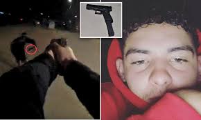 Arizona police bodycam video shows boy, 17, shot dead as he reaches for gun 