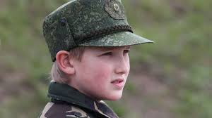 As 100,000 marched in belarus capital, lukashenko armed himself with a kalashnikov president totes a rifle and wears a bulletproof vest as gets off a helicopter that landed at his residence while. Nikloai Lukashenko Alexander Lukashenko S Gun Toting Son 15 Is Being Groomed As Belarus King Joffrey