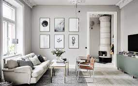 The blue wall makes the room less drab because of the painting hung in it. 1001 Ideas For Colors That Go With Gray Walls