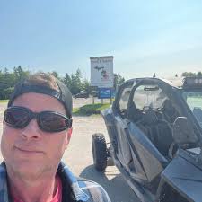 The two men were arrested after a traffic stop revealed a weapon, multiple  illegal drugs, and cash.