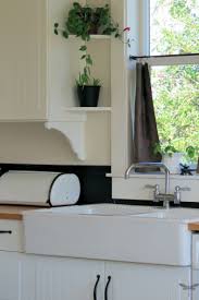 How To Turn Ordinary Cabinets Into Cottage Classics Kitchen Window Shelves New Kitchen Cabinets Diy Kitchen Cabinets