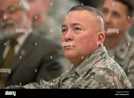 Chief Master Sergeant Mitchell O. Brush, senior enlisted advisor to the  Chief of the National Guard Bureau, listens during a town hall forum at the  Air National Guard Readiness Center at Joint