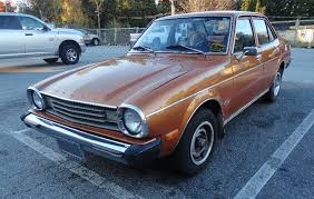 Image result for Bright Yellow 1978 Colt